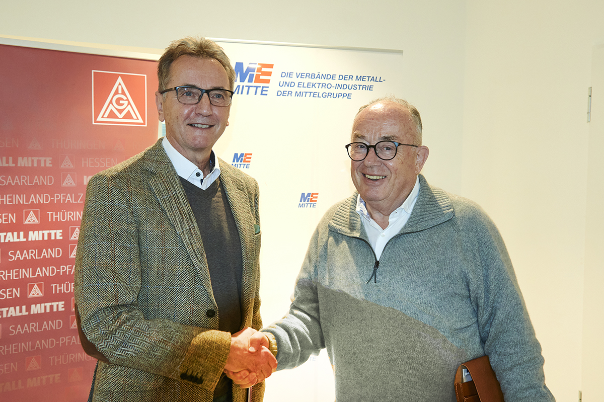 Handshake Jörg Köhlinger und Oswald Bubel